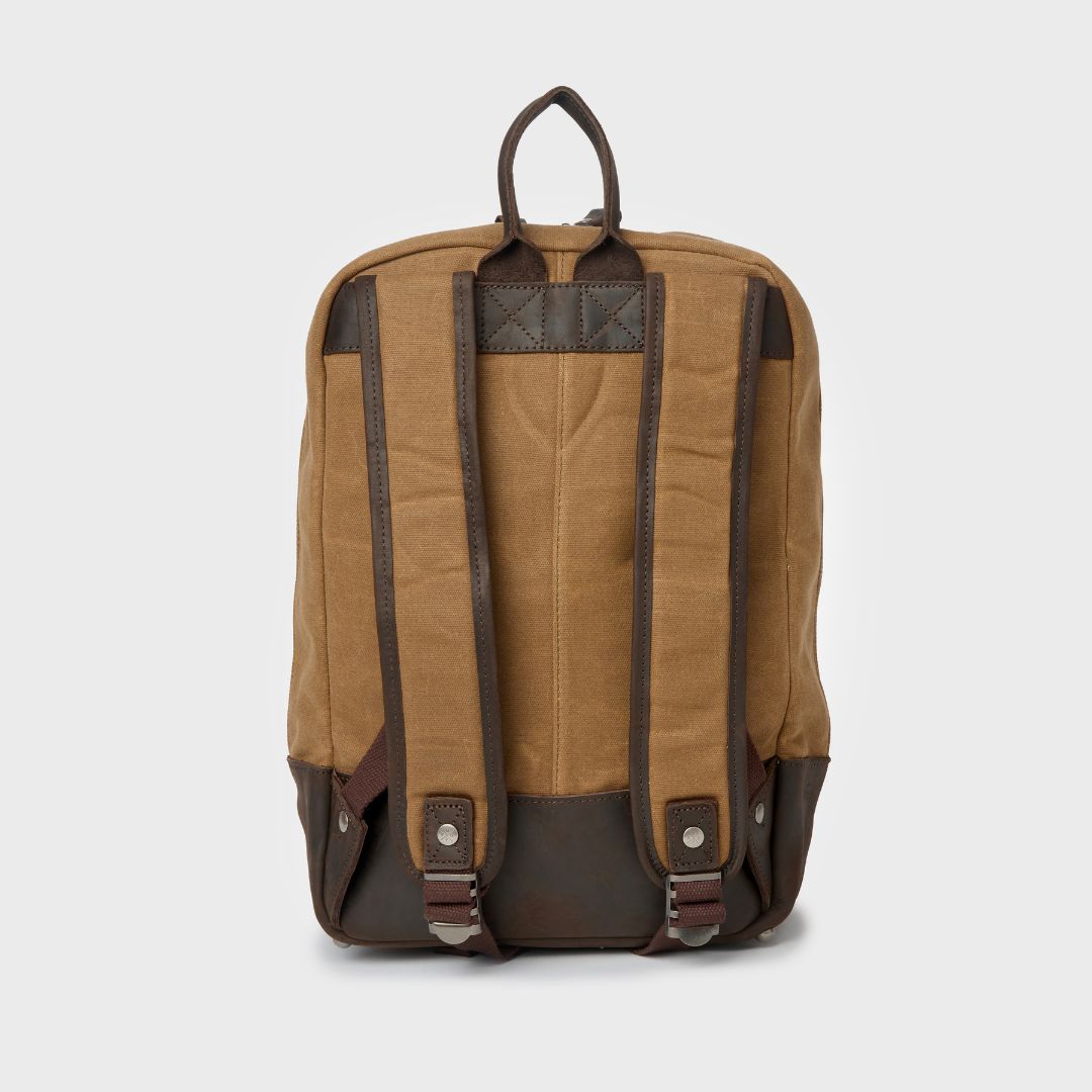 Back view of Eden waxed canvas and leather backpack with padded shoulder straps