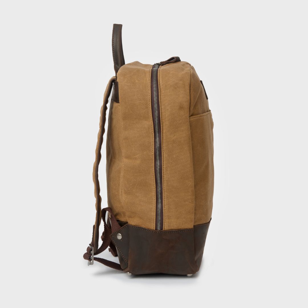 Side view of waxed college canvas laptop backpack with zipper