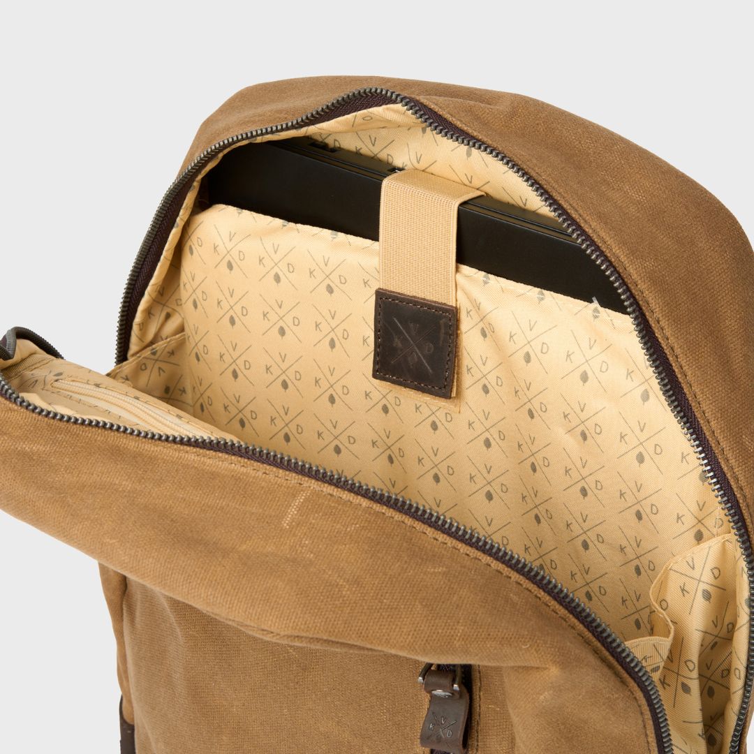 Interior laptop pocket inside the Eden waxed canvas backpack