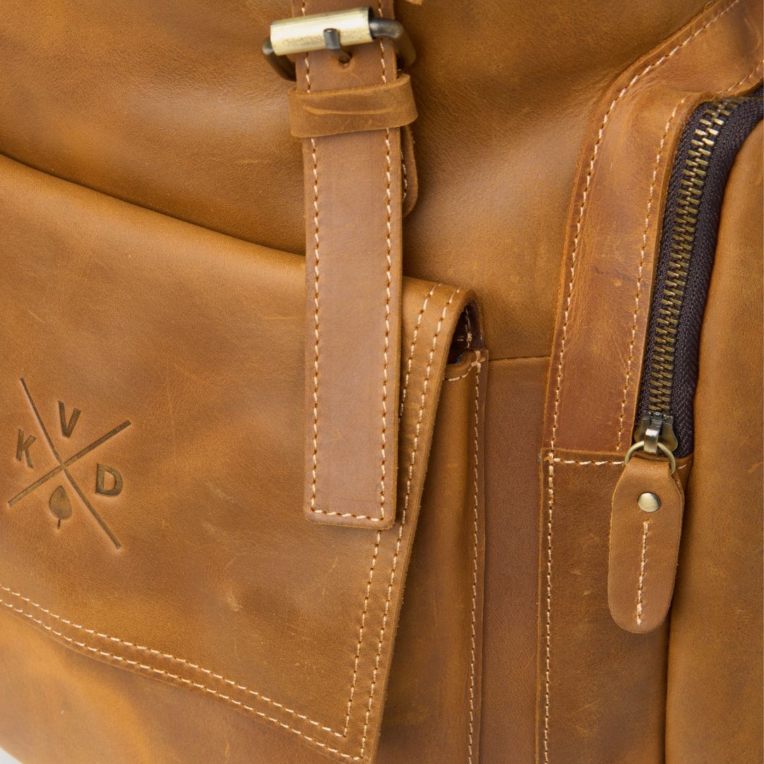 Close up of tan reclaimed leather backpack