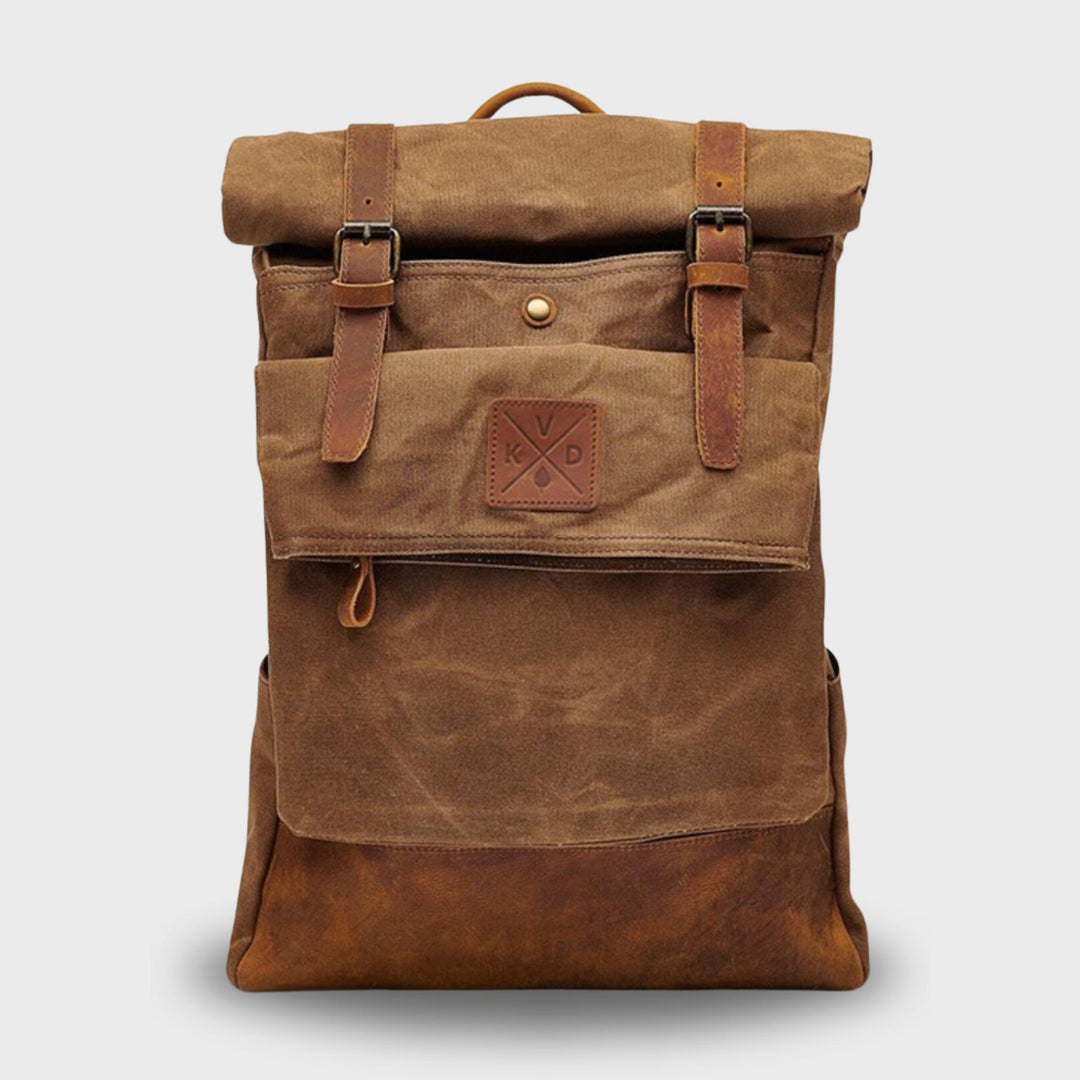 Brown waxed canvas rolltop backpack front view#colour_tan