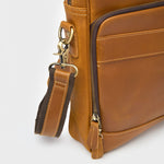 Close up of the metal buckle fastening on the shoulder strap on the Manifold leather work satchel