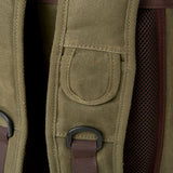 Close up image of waxed canvas on the Moss Green Roe camera/adventure backpack.