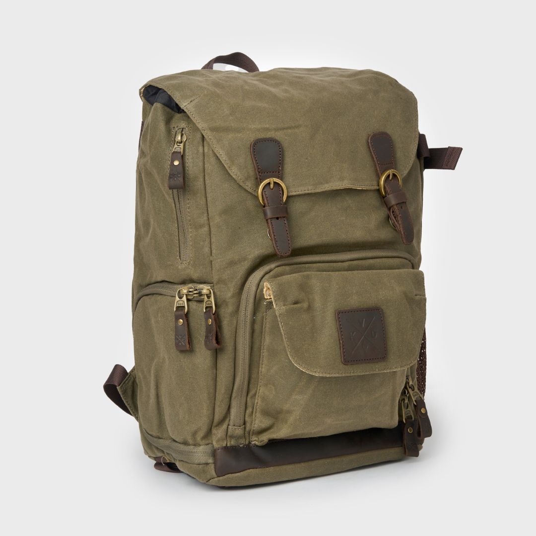 Angled image of the Roe - Moss Green backpack.