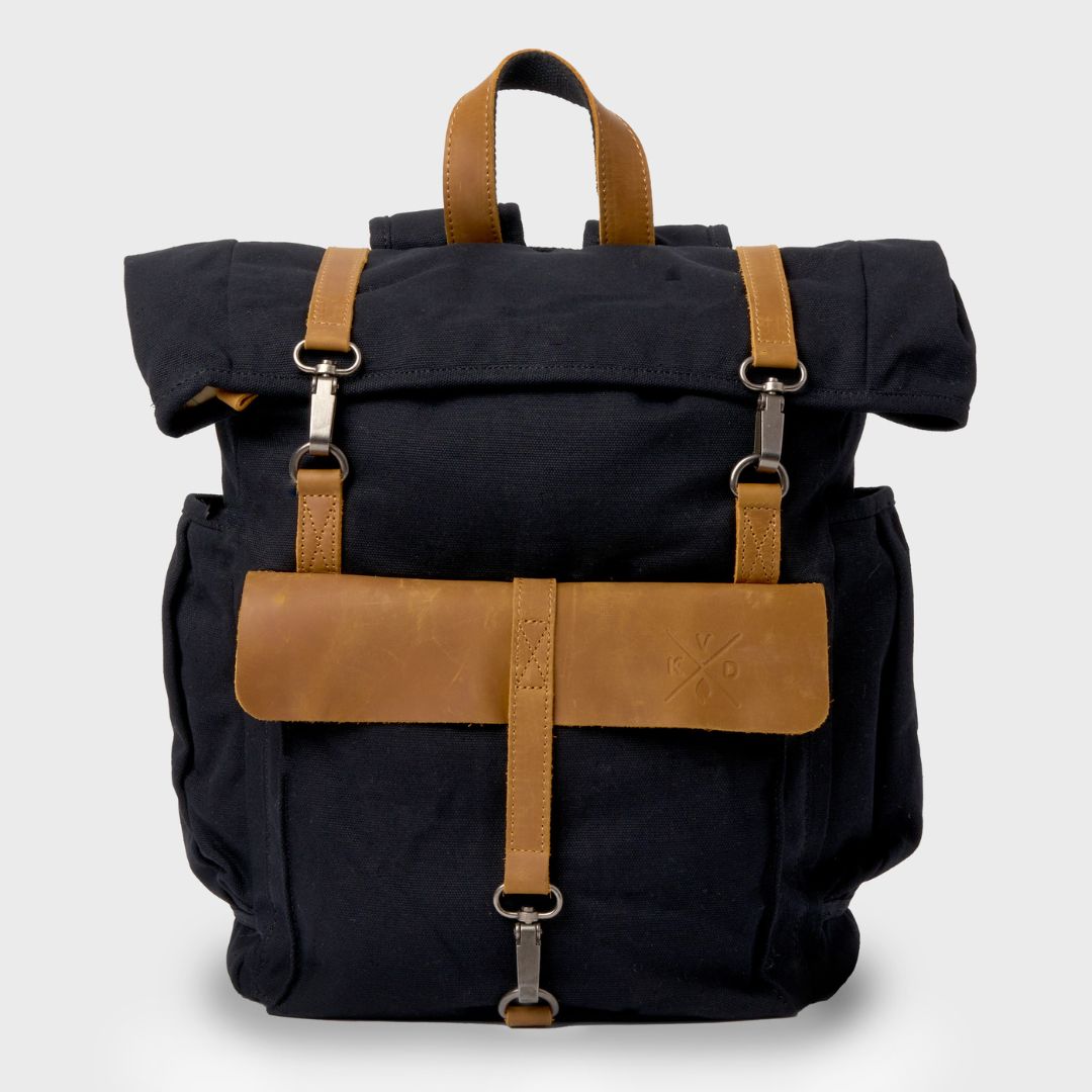 Front view of the Tay rolltop canvas backpack in black