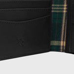 Close up image of the reclaimed leather and polyester lining inside the  the Ashford - Black Leather Wallet.