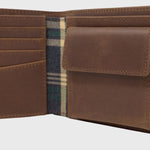 Close up view of the premium reclaimed leather and the polyester tartan lining inside the Ashford - Tan Wallet