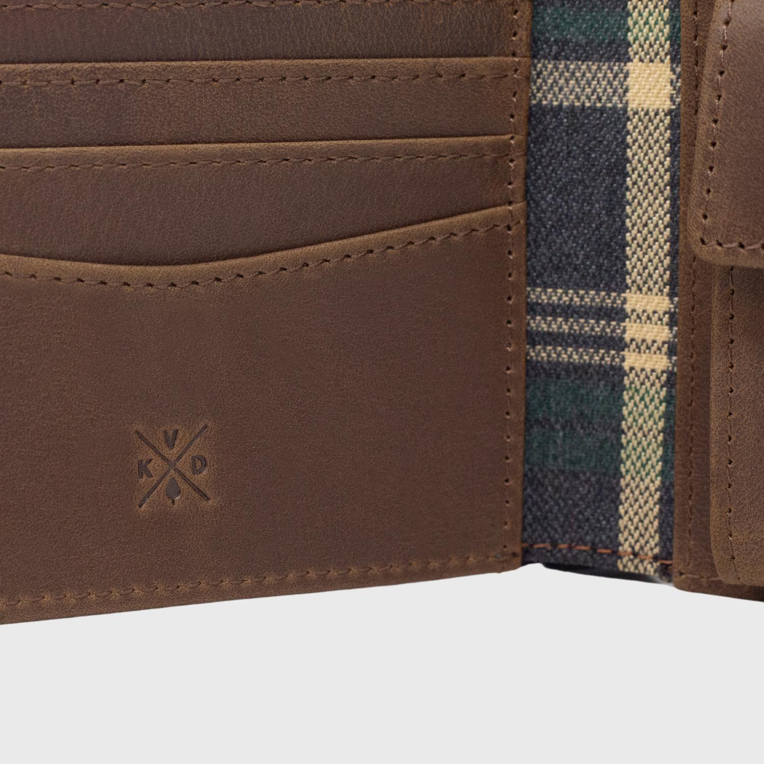 Close up image of the premium reclaimed leather and the polyester tartan lining inside the Ashford -Tan Leather Wallet