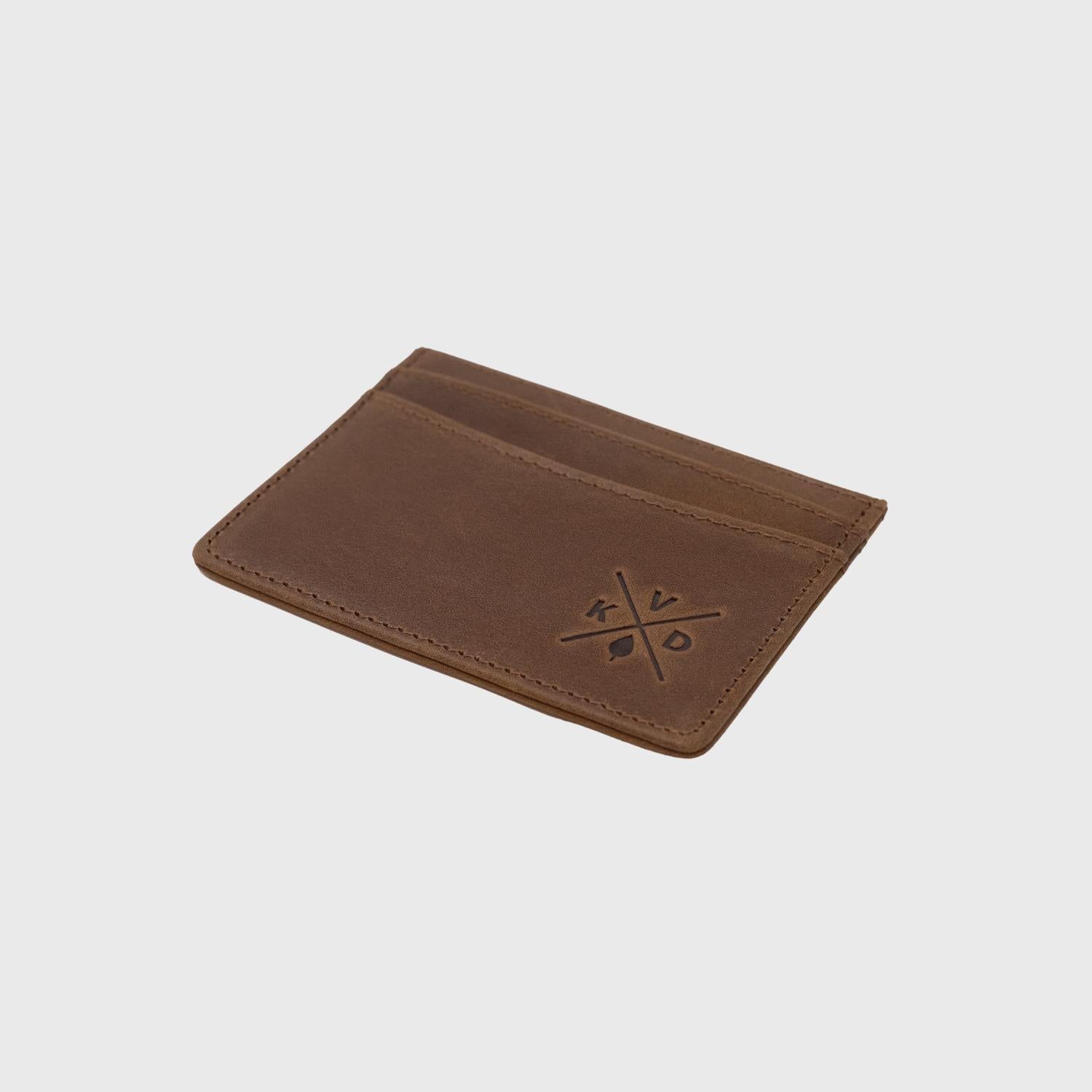 The slimline  Darwell- Tan reclaimed leather card holder with the Kovered logo embossed into the leather.