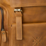 Close up of magnetic buckle on reclaimed leather Esk backpack 