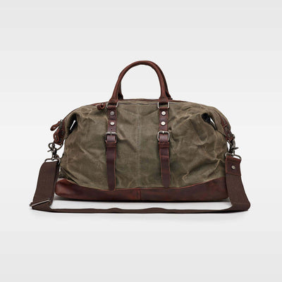 Kovered Humber holdall duffle bag in moss green made from reclaimed leather and waxed canvas#colour_moss-green