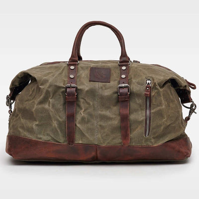 Kovered moss green Humber holdall duffle bag made from waxed canvas and reclaimed leather front view#colour_moss-green