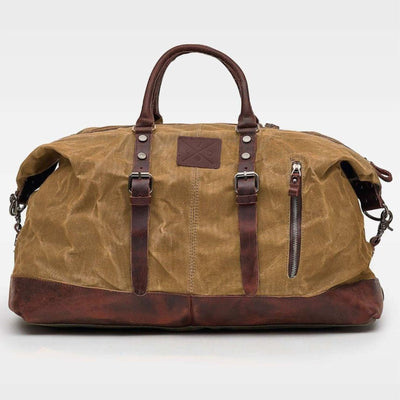 Kovered Tan Humber holdall made from waxed canvas and reclaimed leather front view#colour_tan