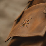 Close up of Kovered logo embossed into leather