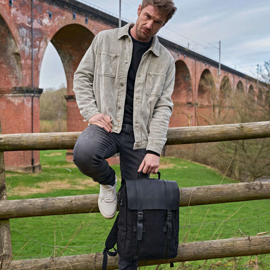 Kovered Tamar black canvas and reclaimed leather backpack on model#colour_black