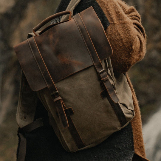 Kovered Tamar moss green reclaimed leather backpack on male model#colour_moss-green