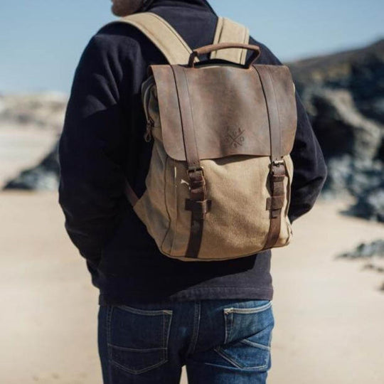 Kovered Tamar tan canvas backpack on male model#colour_tan