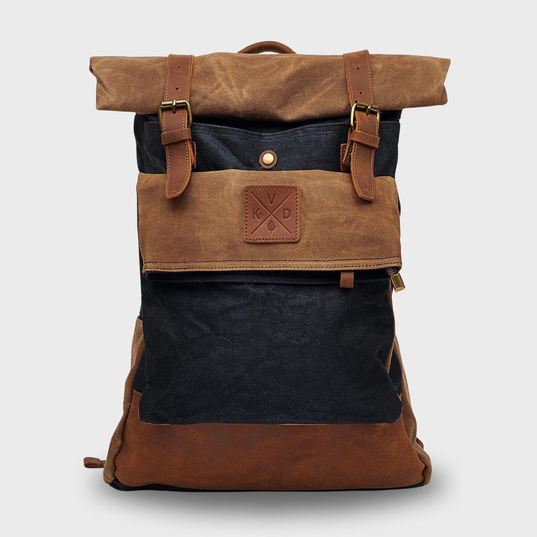 Black and tan waxed canvas rolltop backpack front view#colour_black