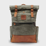 Green rolltop waxed canvas backpack with magnetic buckles#colour_moss-green