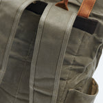 Green waxed canvas rolltop backpack detail#colour_moss-green