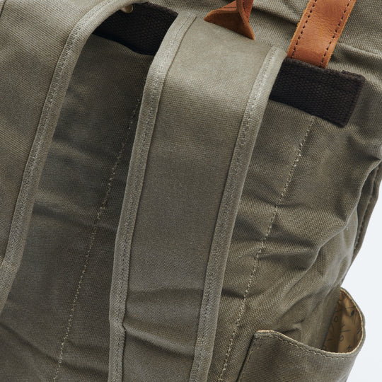 Green waxed canvas rolltop backpack detail#colour_moss-green