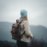 Kovered Tay canvas and reclaimed leather backpack on model in Scotland#colour_taupe