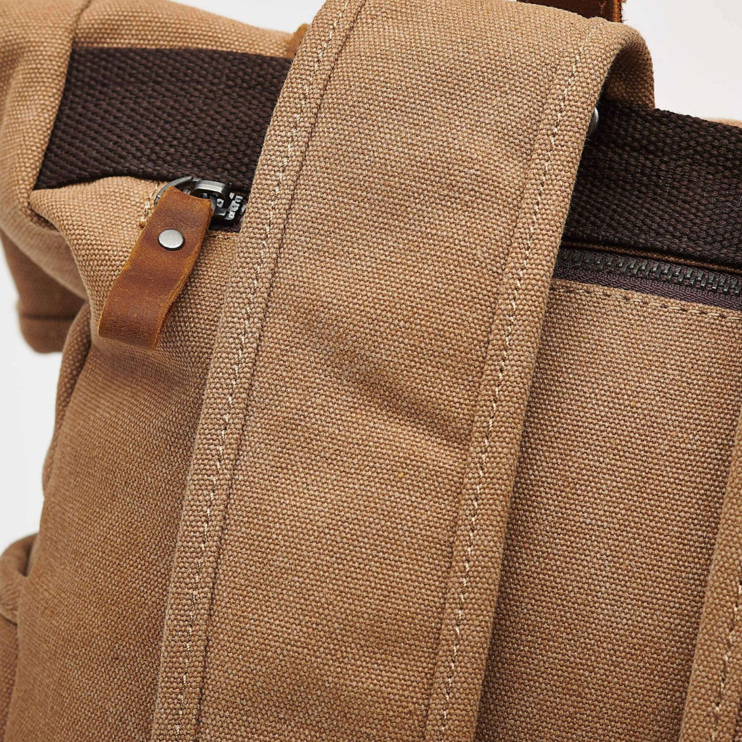 Kovered Tay tan canvas and reclaimed leather backpack close up of backpack strap#colour_tan