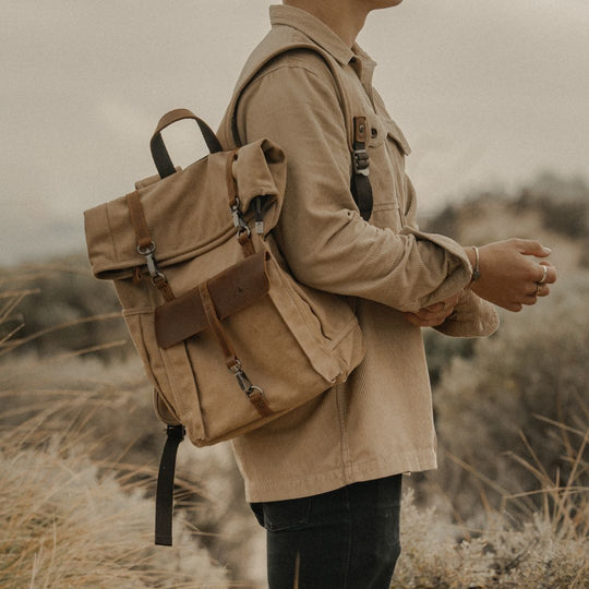 Kovered Tay sustainable reclaimed leather backpack on model in Australia#colour_tan