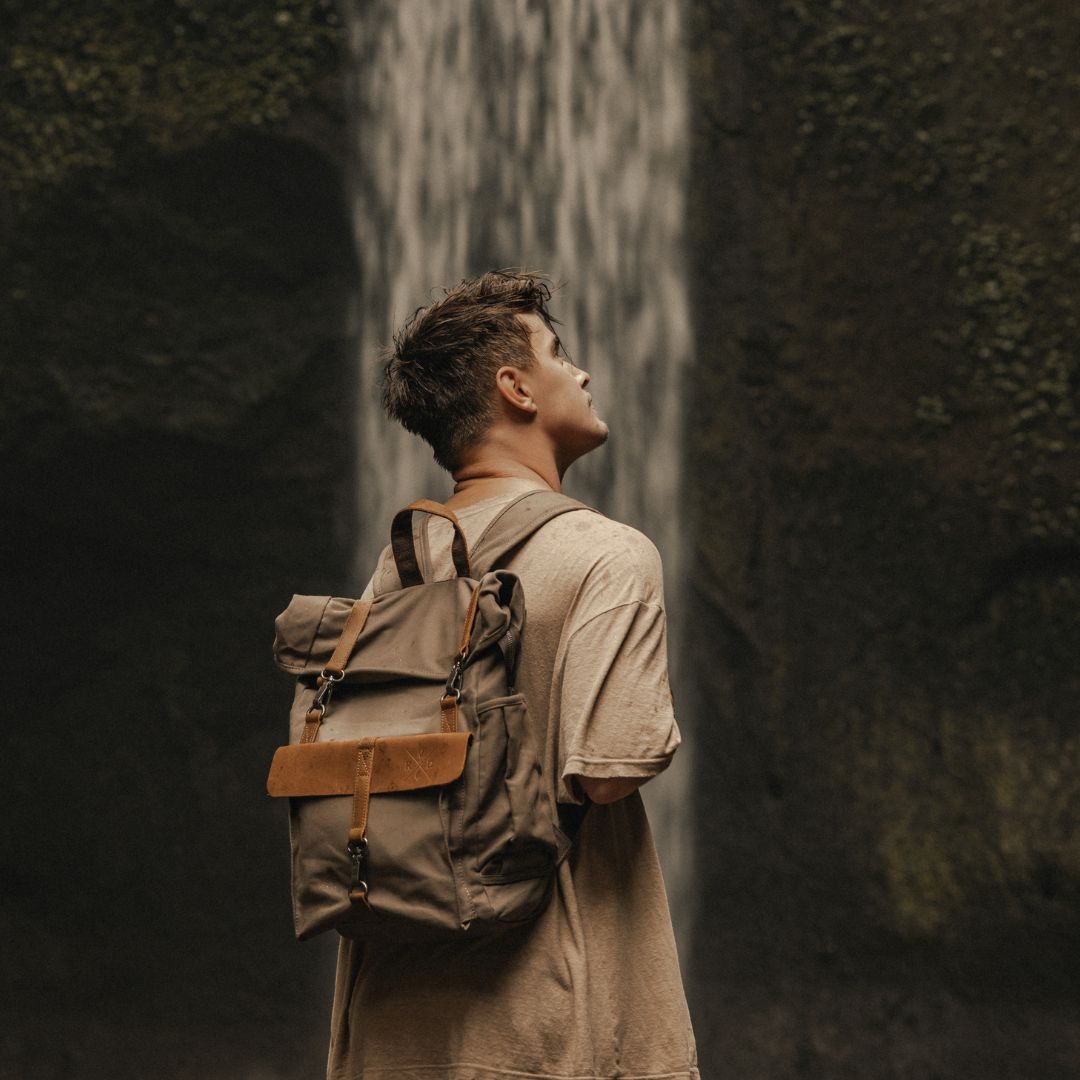 Tay canvas and reclaimed leather backpack Taupe in on Model in Bali#colour_taupe