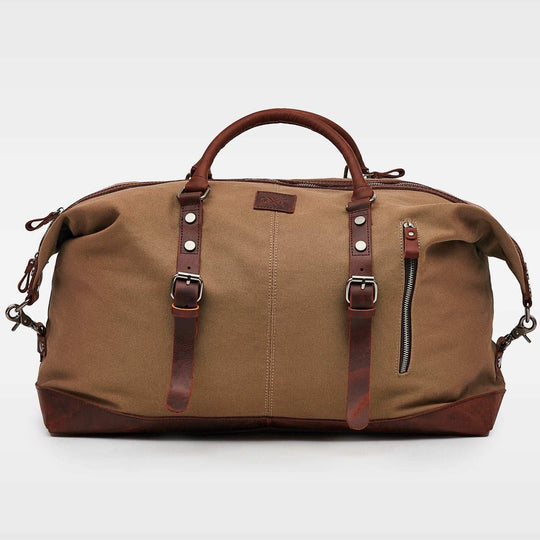 Kovered Torridge canvas and reclaimed leather holdall front view#colour_brown