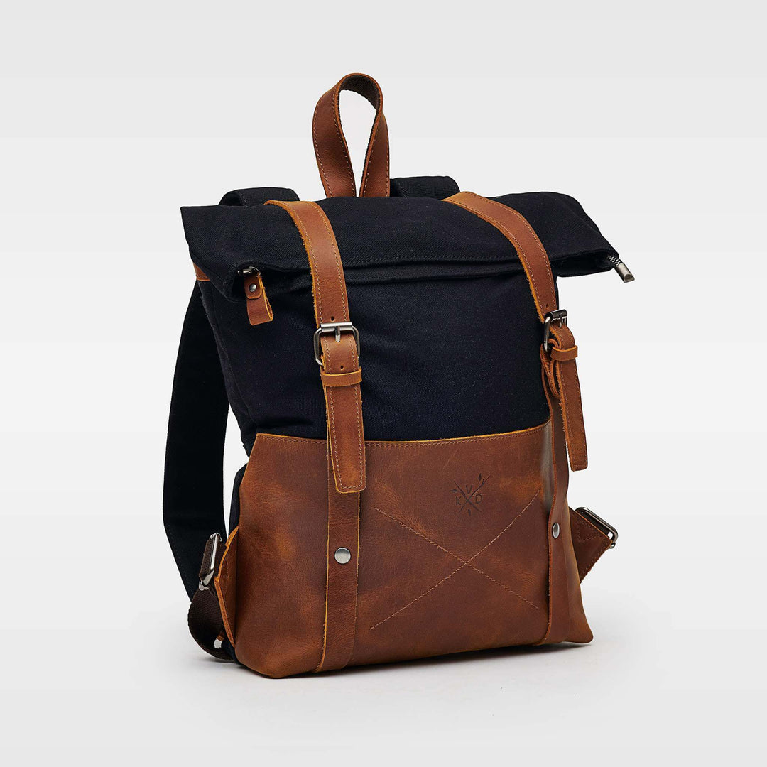 Witham black and tan sustainable made backpack angled view#colour_black