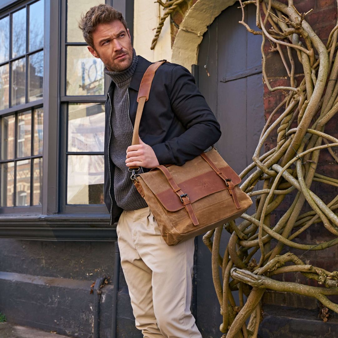 Male model wearing Medway messenger bag with detachable shoulder strap#colour_brown