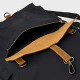 Front pocket with metal clip fastener on the Tay canvas backpack
