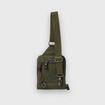 Green shoulder bag on a light gray background
