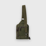 Green shoulder bag on a light gray background